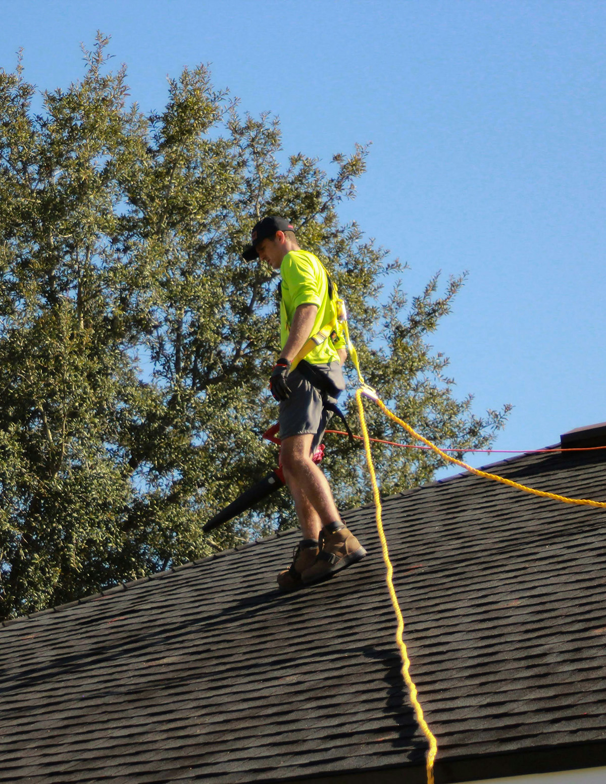 man working on roof